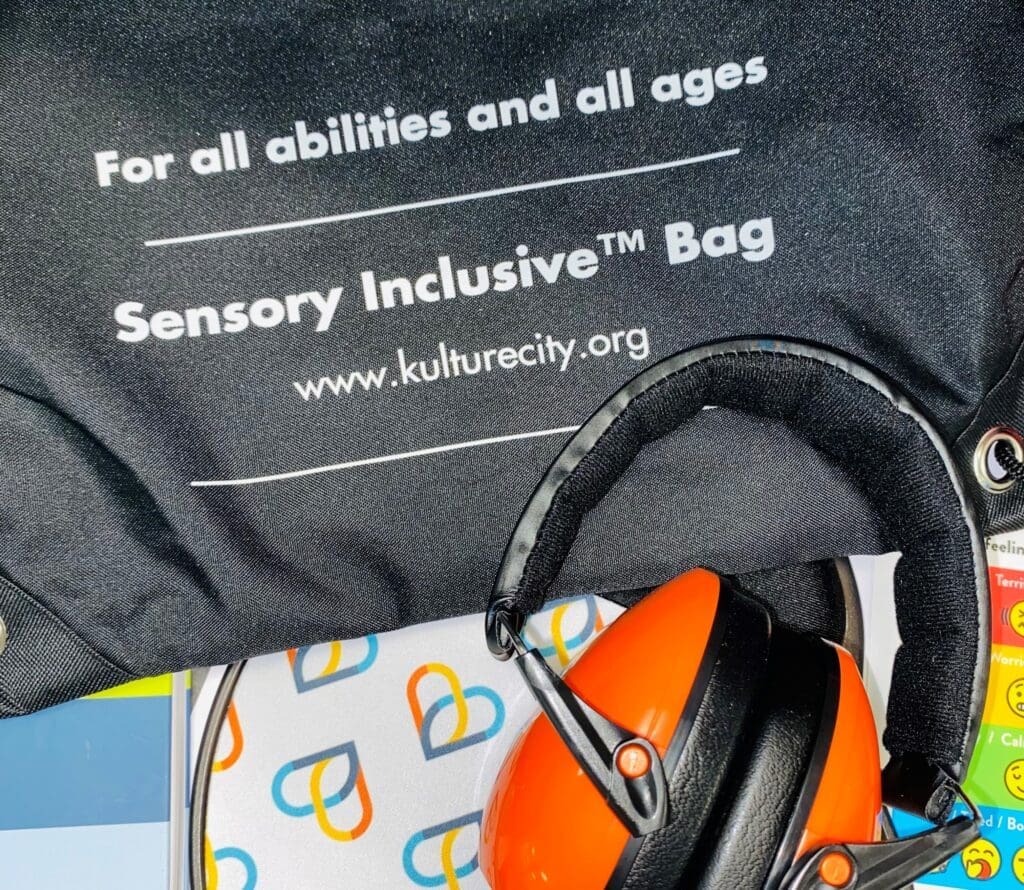 JCPH has partnered with KultureCity® to earn Sensory Inclusive™ Certified status and accommodate guests with sensory needs. This image shows noise cancelling headphones, fidget toys, and communication cards.