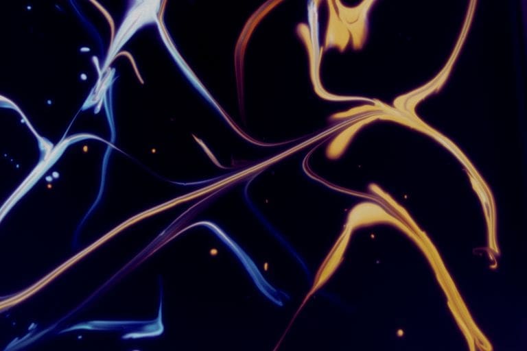 Colorful swirling abstract art with dynamic fluid shapes and a dark background.
